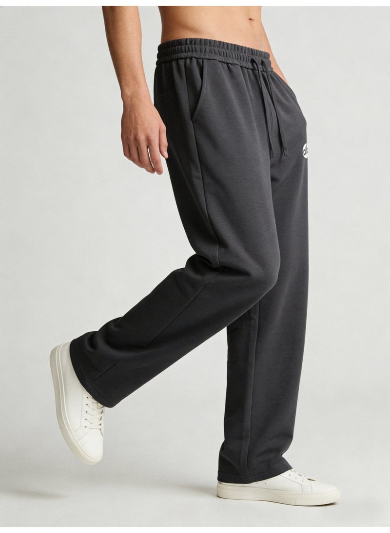 Alo Yoga Ultra-Soft High-Waisted Wide-Leg Track Pants in Charcoal - Image 4